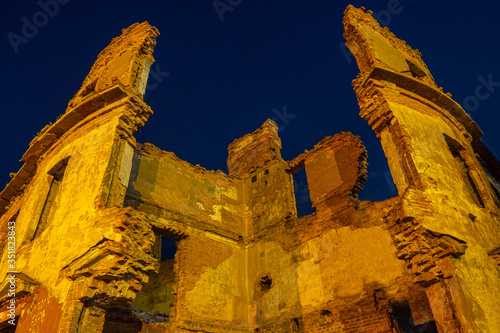 A ruined building against a...