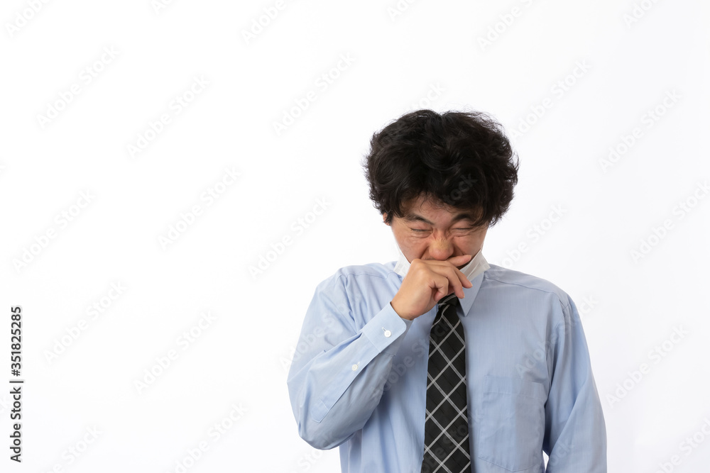 風邪の症状があるビジネスマン