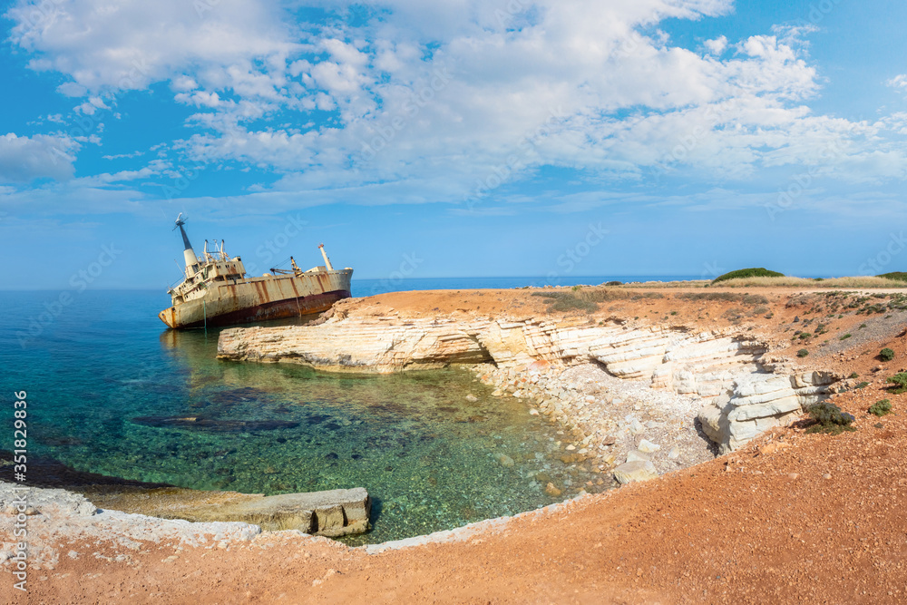Cyprus beach. An abandoned ship off the coast of Cyprus. Shipwre