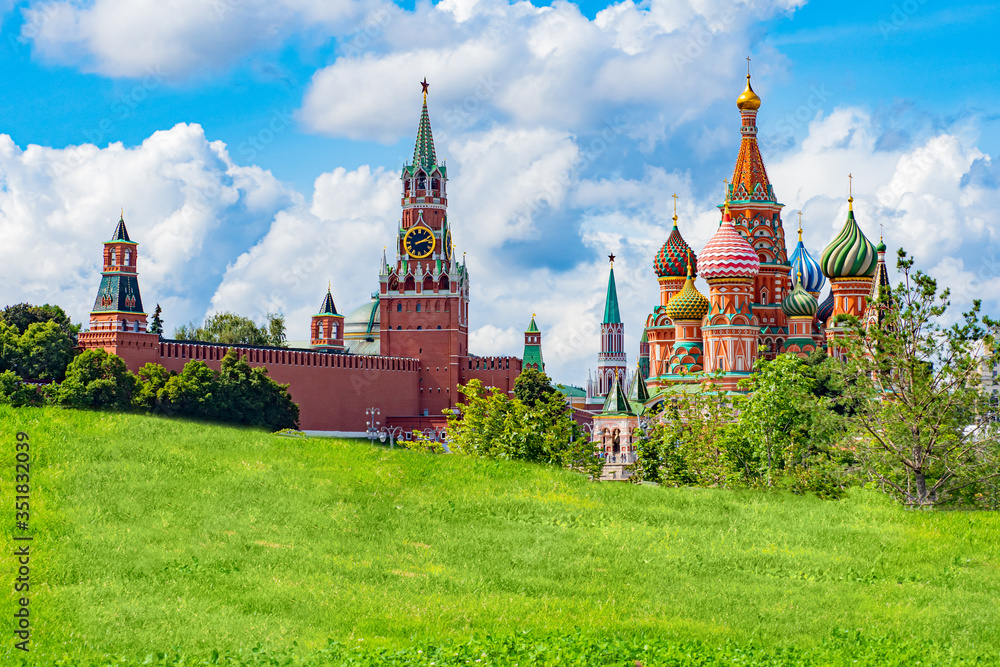 Moscow. Russia. Sights of Russia on the background of green grass. Kremlin. St. Basil's Church. Red square. Russian capital on a Sunny summer day. Travel to Russia.