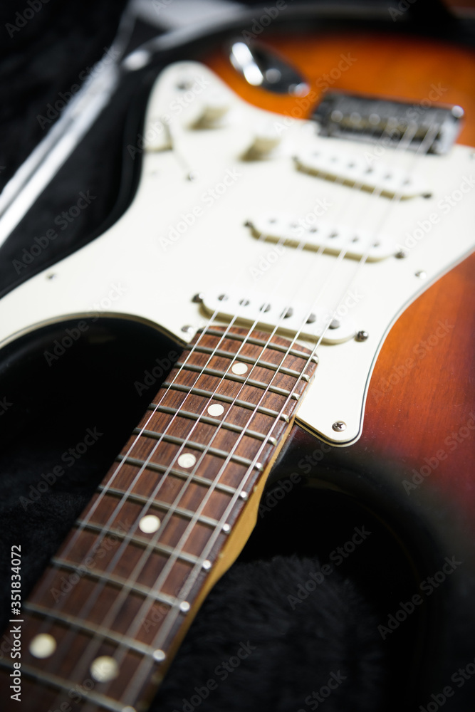 Fototapeta premium A closeup photo of an electric guitar in a guitar case.