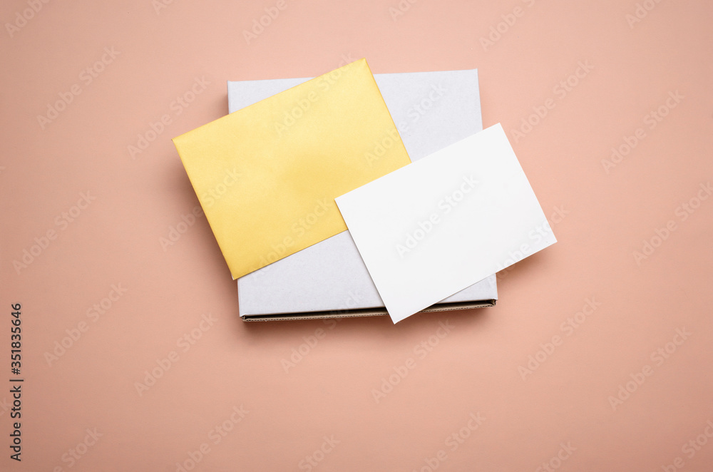 Envelope with a white sheet for text on a light background. Envelope with a white sheet for text on a light background.