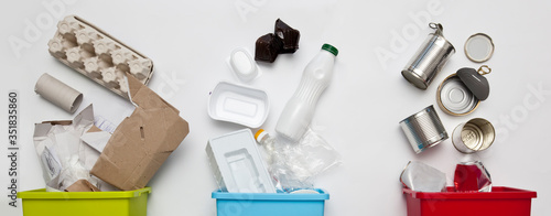 Canvastavla Three different container for sorting garbage