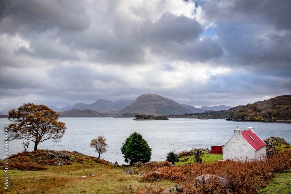 Ardheslaig Loch Shieldaig Torridon mountains in the dramatic highlands of scenic Scotland, fantastic adventure travel destination or holiday vacation to view picturesque scenery at sunrise or sunset