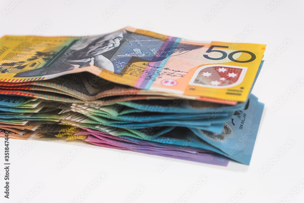 Stack of australian cash notes on a white background Stack of australian cash notes on a white background