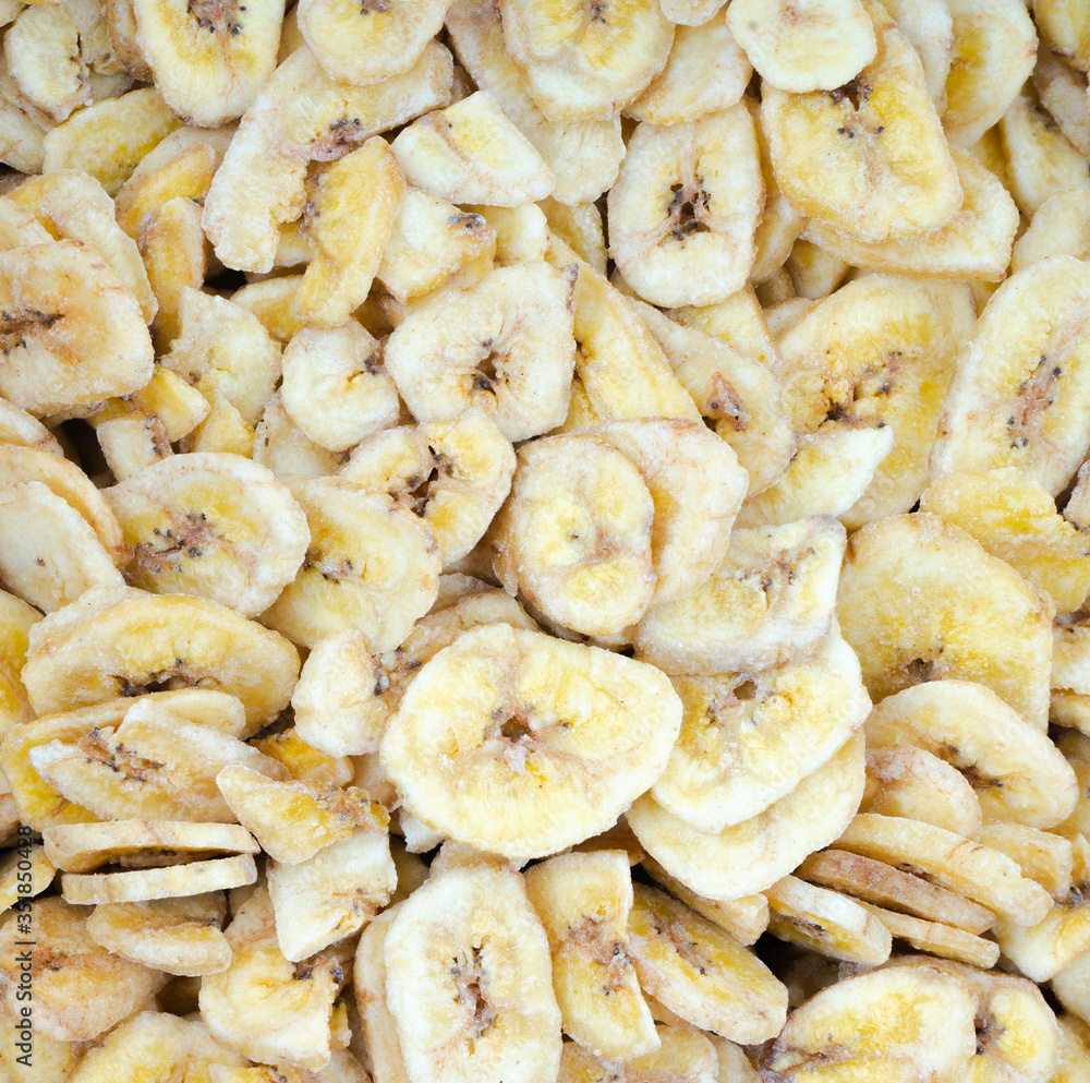 Dehydrated slices of fresh ripe bananas as a background