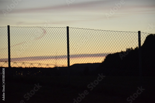 fence with barbed wire