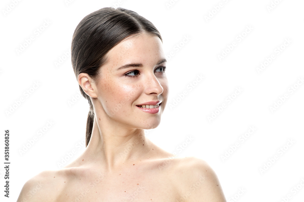 A close-up portrait of a girl with freckles and clear skin. Light blue eyes. The girl has different emotions, she looks at the camera. Isolated on a white background A close-up portrait of a girl with freckles and clear skin. Light blue eyes. The girl has different emotions, she looks at the camera. Isolated on a white background