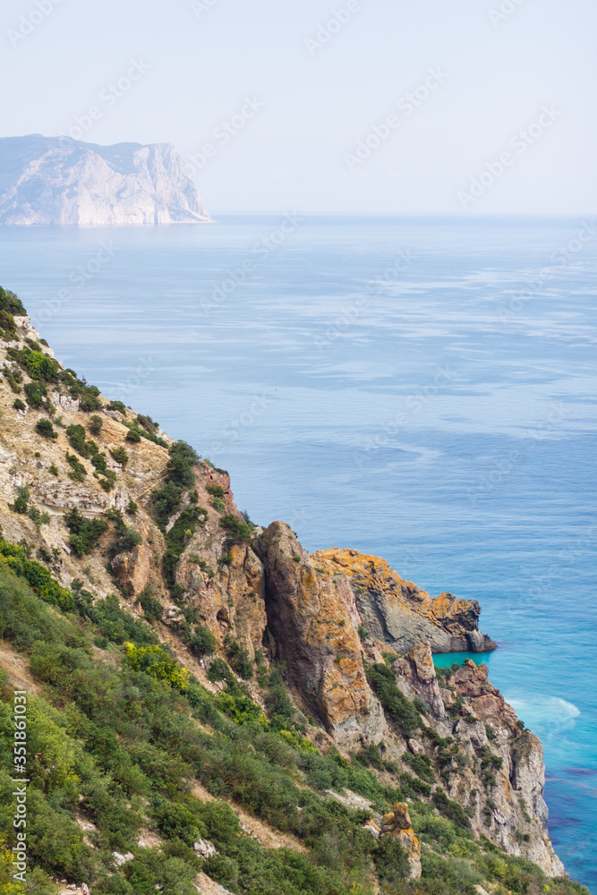 Local tourism in Crimea. Cliffs And Water. Skyes rocks, rocks, & lochs. Seascape of Cape Fiolent, Crimea. Seascape With Big Rocks. Black Sea View at Crimea, Russia, Ukraine. cliffs at the coastline