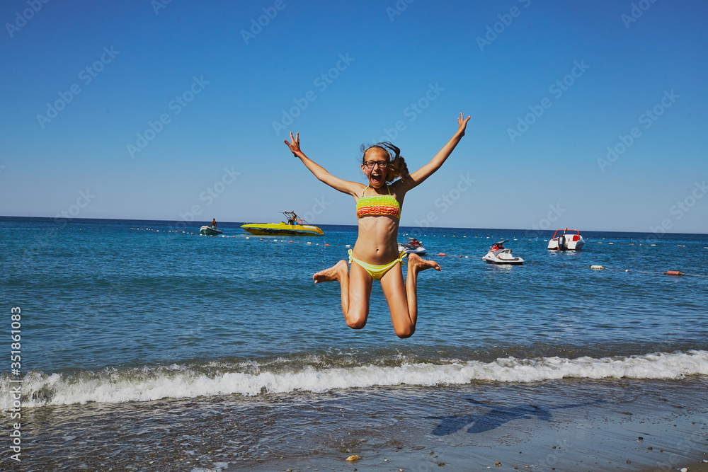 Girl at sea. On the shoreline. Girl at sea. On the shoreline.