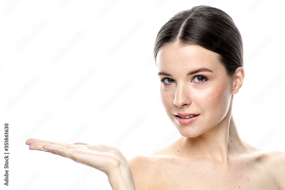 A close-up portrait of a girl with freckles and clear skin. Light blue eyes. The girl has different emotions, she looks at the camera. Isolated on a white background A close-up portrait of a girl with freckles and clear skin. Light blue eyes. The girl has different emotions, she looks at the camera. Isolated on a white background