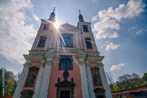 Baroque Church of Saint Anne and Saint James the Greater in Stara Voda. Towers in counterlight. photo