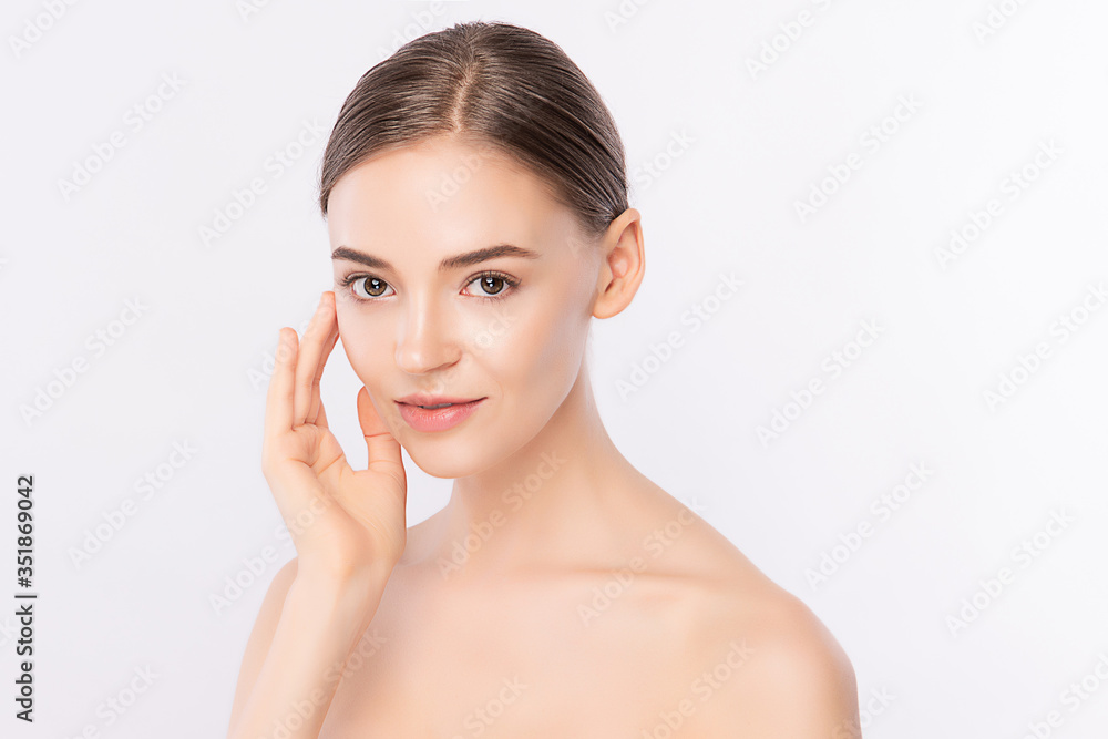 Beautiful Young Woman touching her clean face with fresh Healthy Skin, isolated on white background, Beauty Cosmetics and Facial treatment Concept. Beautiful Young Woman touching her clean face with fresh Healthy Skin, isolated on white background, Beauty Cosmetics and Facial treatment Concept.