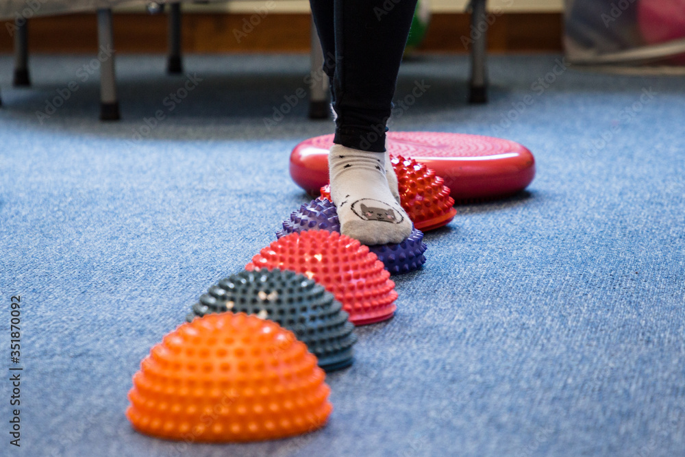 Pediatric Sensory Integration Therapy a child walking on a sensory