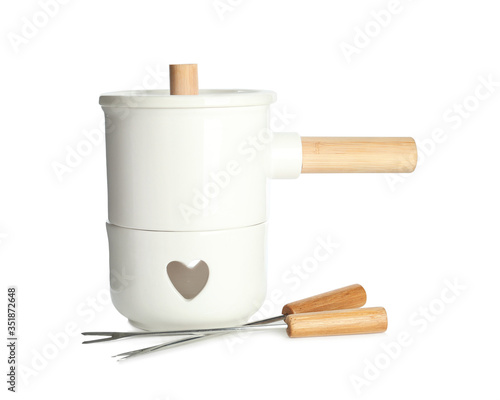 Fondue set isolated on white. Cooking utensils