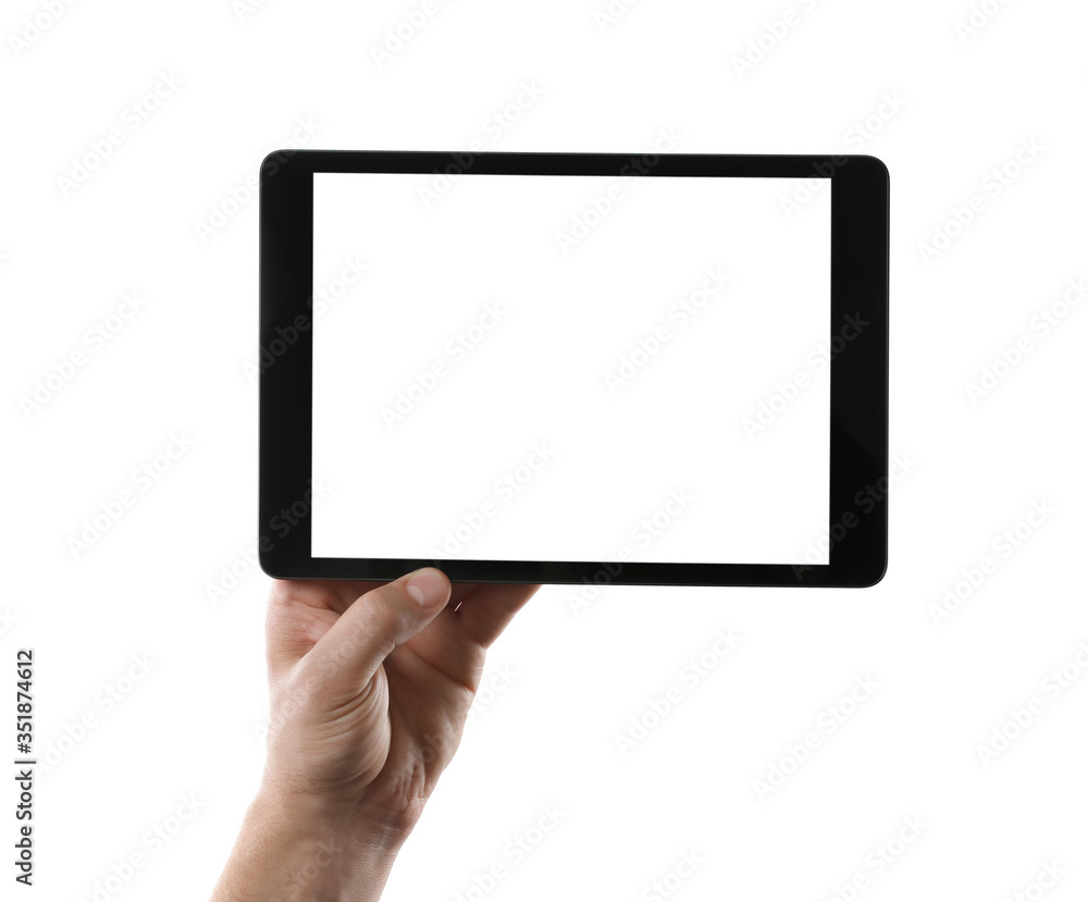 Man holding tablet computer with blank screen on white background, closeup. Modern gadget Man holding tablet computer with blank screen on white background, closeup. Modern gadget