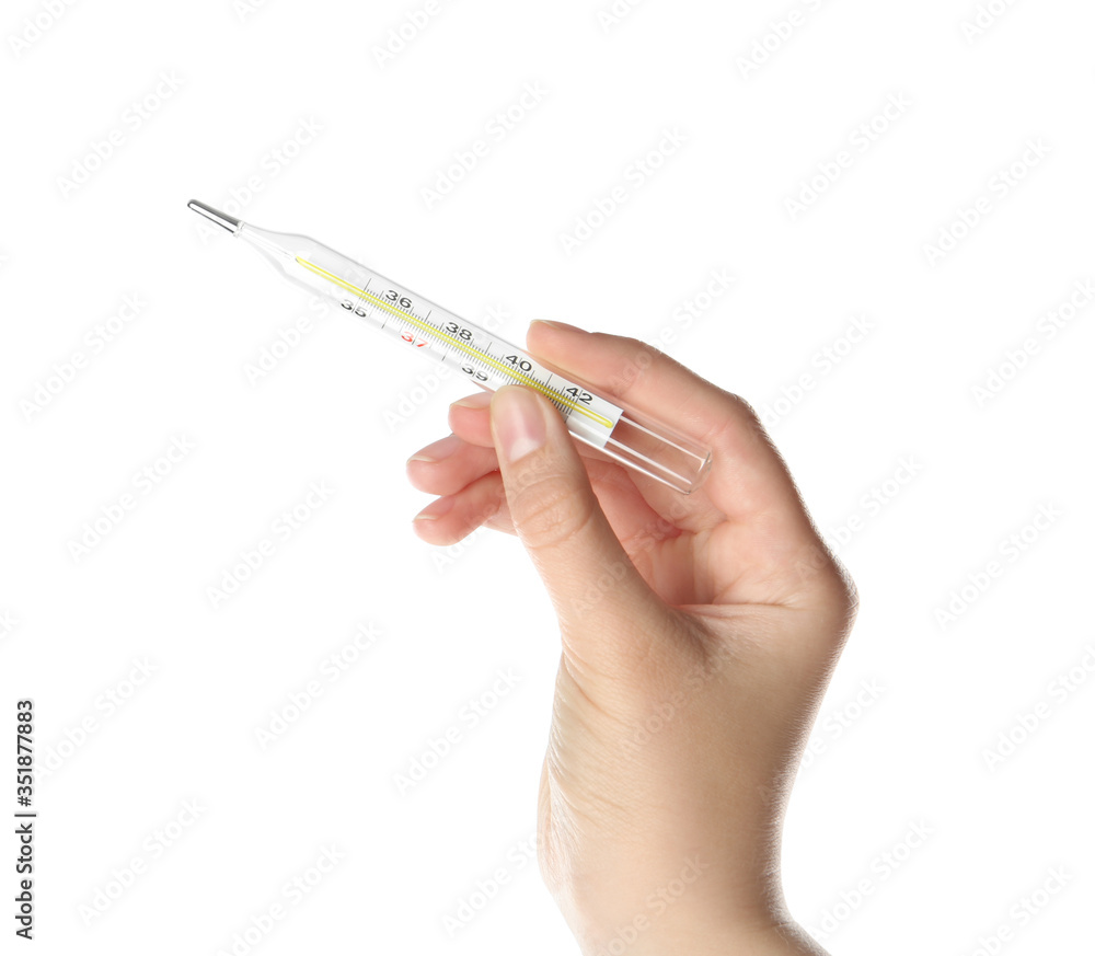 Woman holding mercury thermometer on white background, closeup