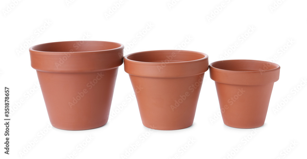 Stylish terracotta flower pots isolated on white Stylish terracotta flower pots isolated on white