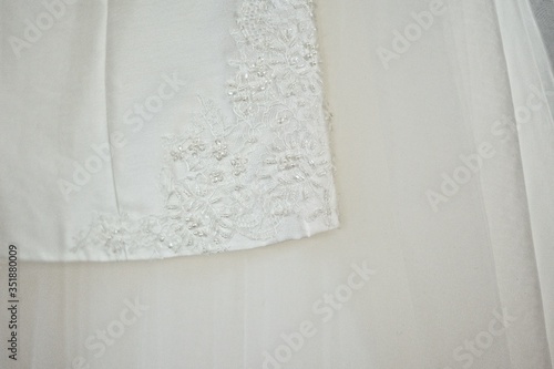 details of the wedding dress. lace white wedding dress close-up © sun_house_ann