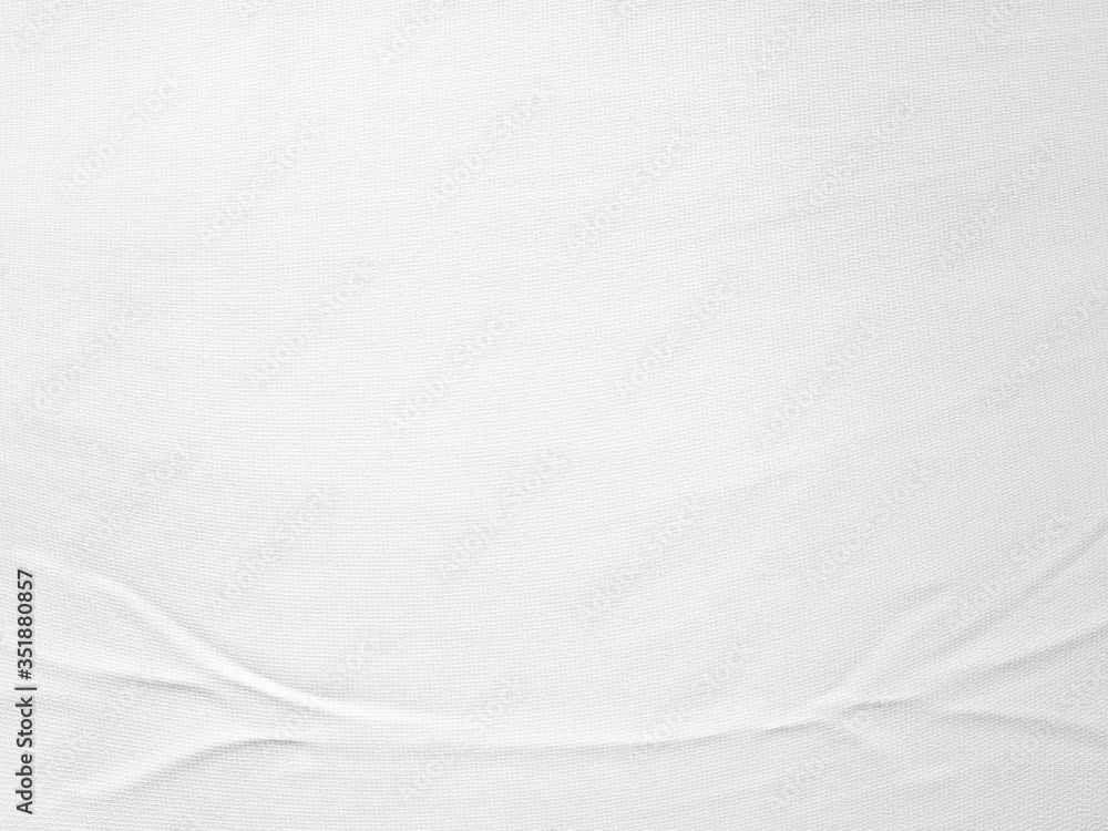 Soft white wrinkled fabric background