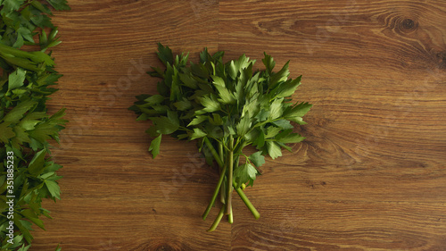Food background with fresh spring lovage leaves