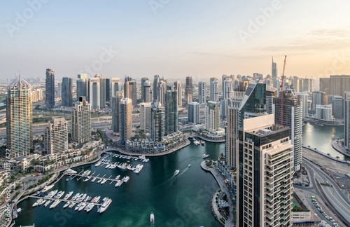 Photography Aerial View of Dubai Marina with Yachts or Boats from a Luxurious Apartment Balc