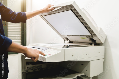 Business people keypad hand on the panel printer, printer, scanner, laser copier, office equipment, concept, start working