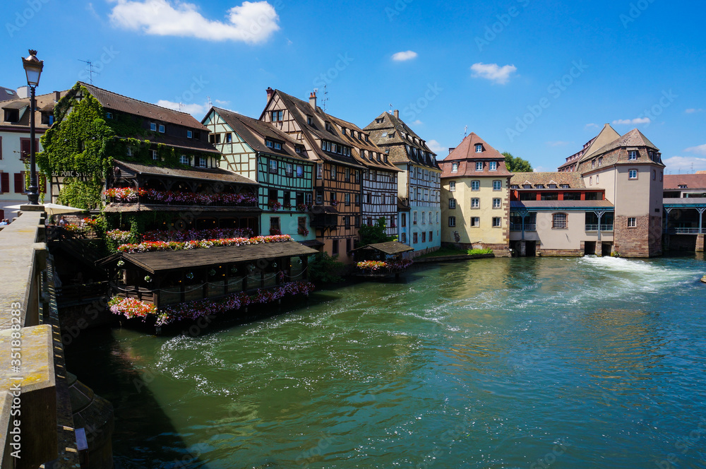 Old half-timbered houses on the river Bank in old Strasbourg