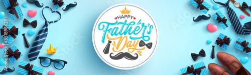 Father's Day poster or banner template with necktie,glasses and gift box on blue background.Greetings and presents for Father's Day in flat lay styling.Promotion and shopping template for love dad