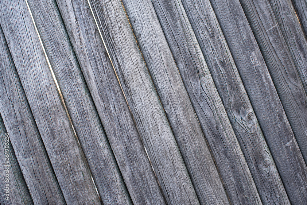The texture of the boards. Brown painted fence. The texture of the boards. Brown painted fence.