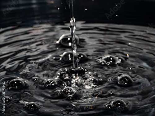 Drop of water,Water background / Water is a transparent, tasteless, odorless, and nearly colorless chemical substance, which is the main constituent of Earth's streams © Tle