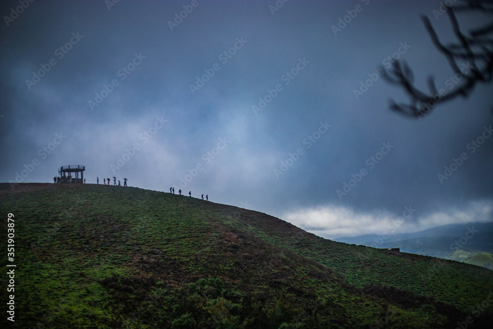 beautiful landscape view people walking on edge of hill, Mugilupete, India