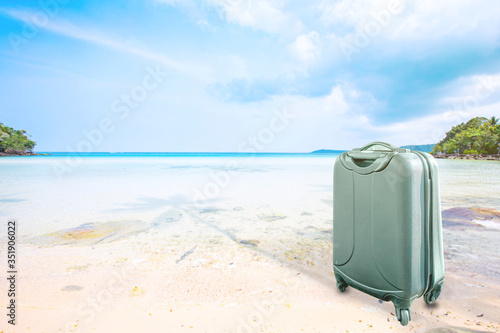 suitcase or luggage over tropical blue sea background  Image for business and travel on vacation concept