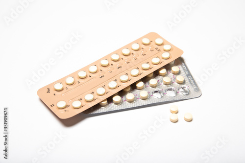 Female hormonal contraceptives on a white background