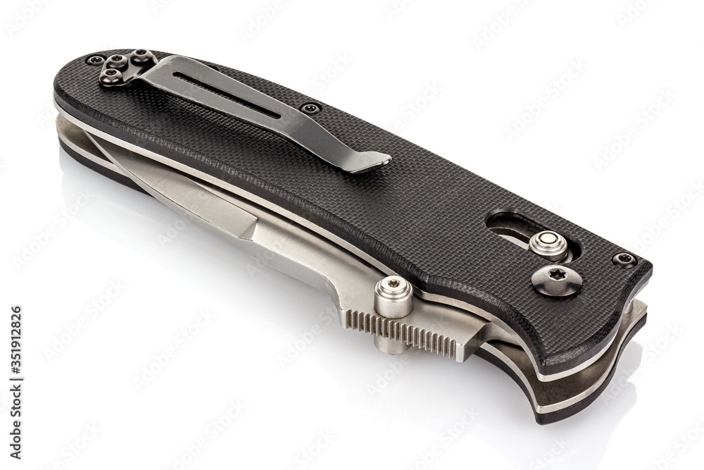 Closed folding pocket knife with textured black composite plastic cover plates on steel handle isolated on white background with reflection on glossy surface. Pocket knife close-up image Closed folding pocket knife with textured black composite plastic cover plates on steel handle isolated on white background with reflection on glossy surface. Pocket knife close-up image