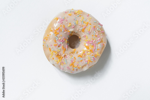 Appetizing sweet donut on a white background. Top view