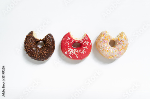 Appetizing sweet donut on a white background. Top view