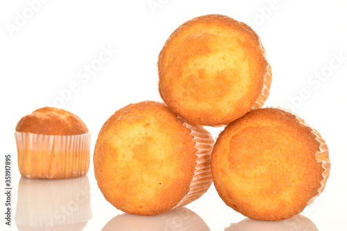 Tasty sweet muffins, close-up, on a white background.