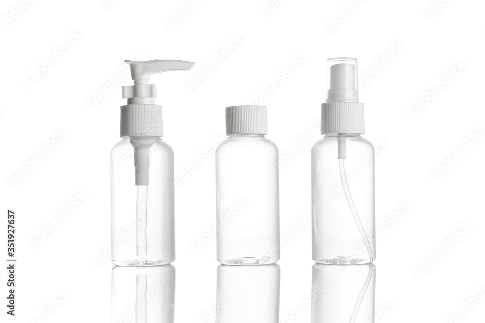 Gel bottle. Clear plastic blank for soap shampoo and mineral cosmetic isolated on white. Water cap spray on transparent background. Hand Alcohol Sanitizer. Gel bottle. Clear plastic blank for soap shampoo and mineral cosmetic isolated on white. Water cap spray on transparent background. Hand Alcohol Sanitizer.