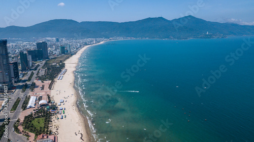 View of the first coastline of Da Nang in Vietnam against the backdrop of the mountains