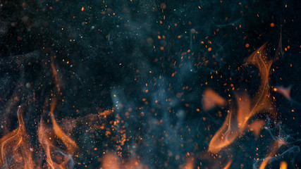 fire flames with sparks on a black background, close-up