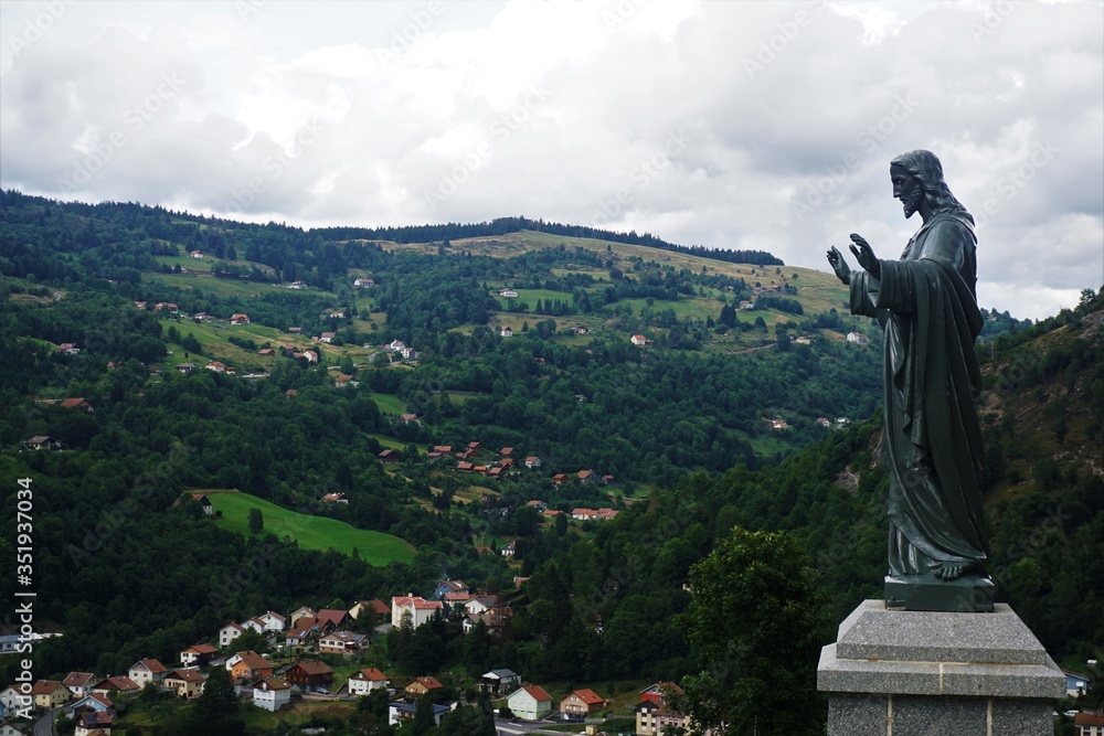 Huge statue of Jesus blessing the village La Bresse