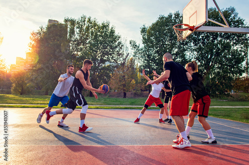 Group Of Young Friends Playing Basketball Match © FS-Stock