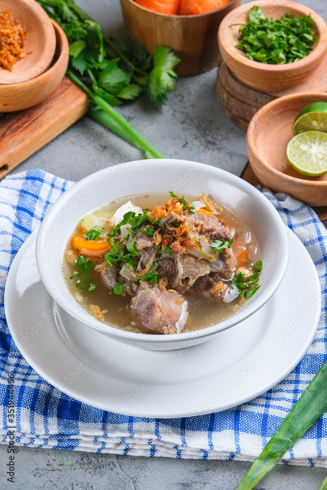 Indonesian traditional culinary, called sop buntut or oxtail soup Indonesian traditional culinary, called sop buntut or oxtail soup