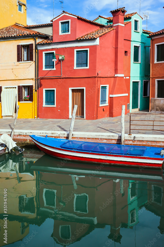 The houses are reflected in the water The houses are reflected in the water