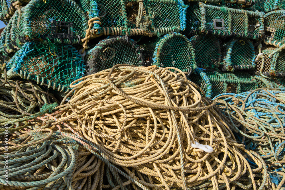 Lobster and Crab pots stacked on the quayside