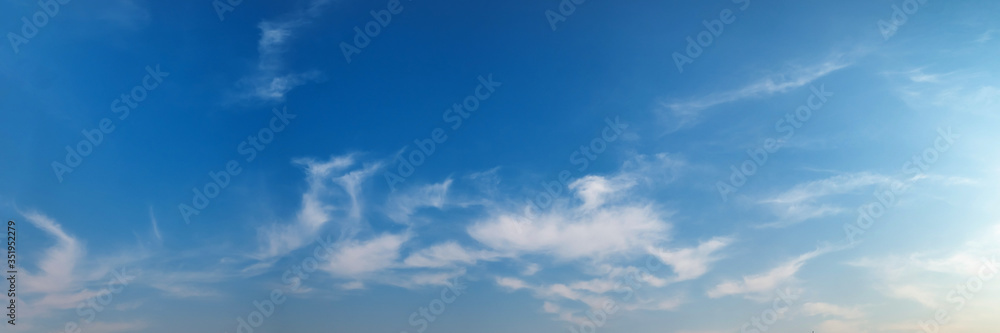 Fototapeta premium Panorama sky with beautiful cloud on a sunny day. Panoramic high resolution image.