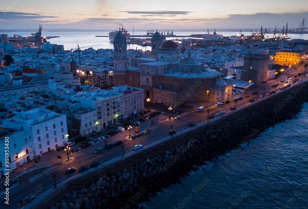 View of illuminated Cadiz town