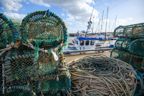 Lobster and Crab pots stacked on the quayside