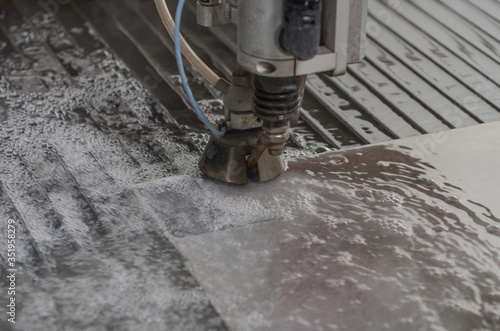 Schilderij op canvas Water jet machine at work Cnc water jet machine